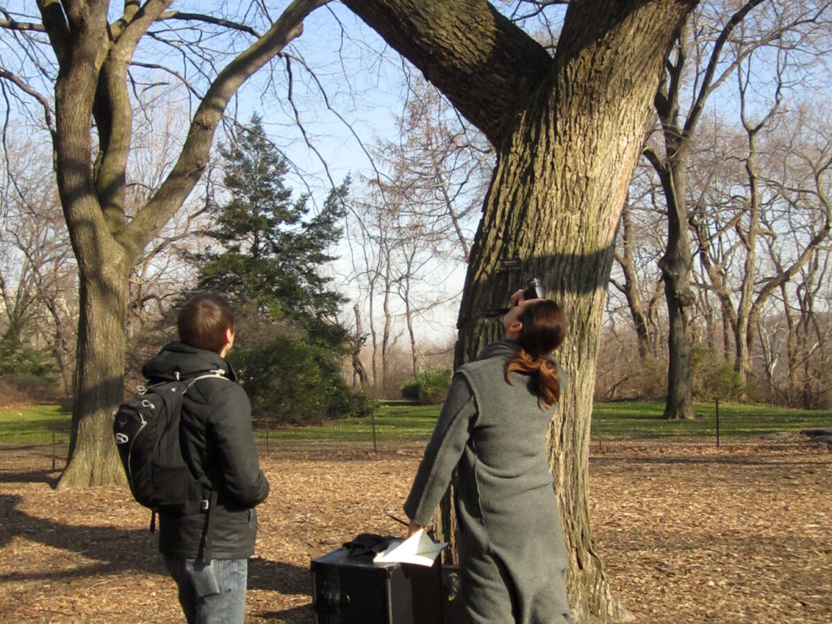 Matt and Vera (left to right) in Central Park checking light readings.